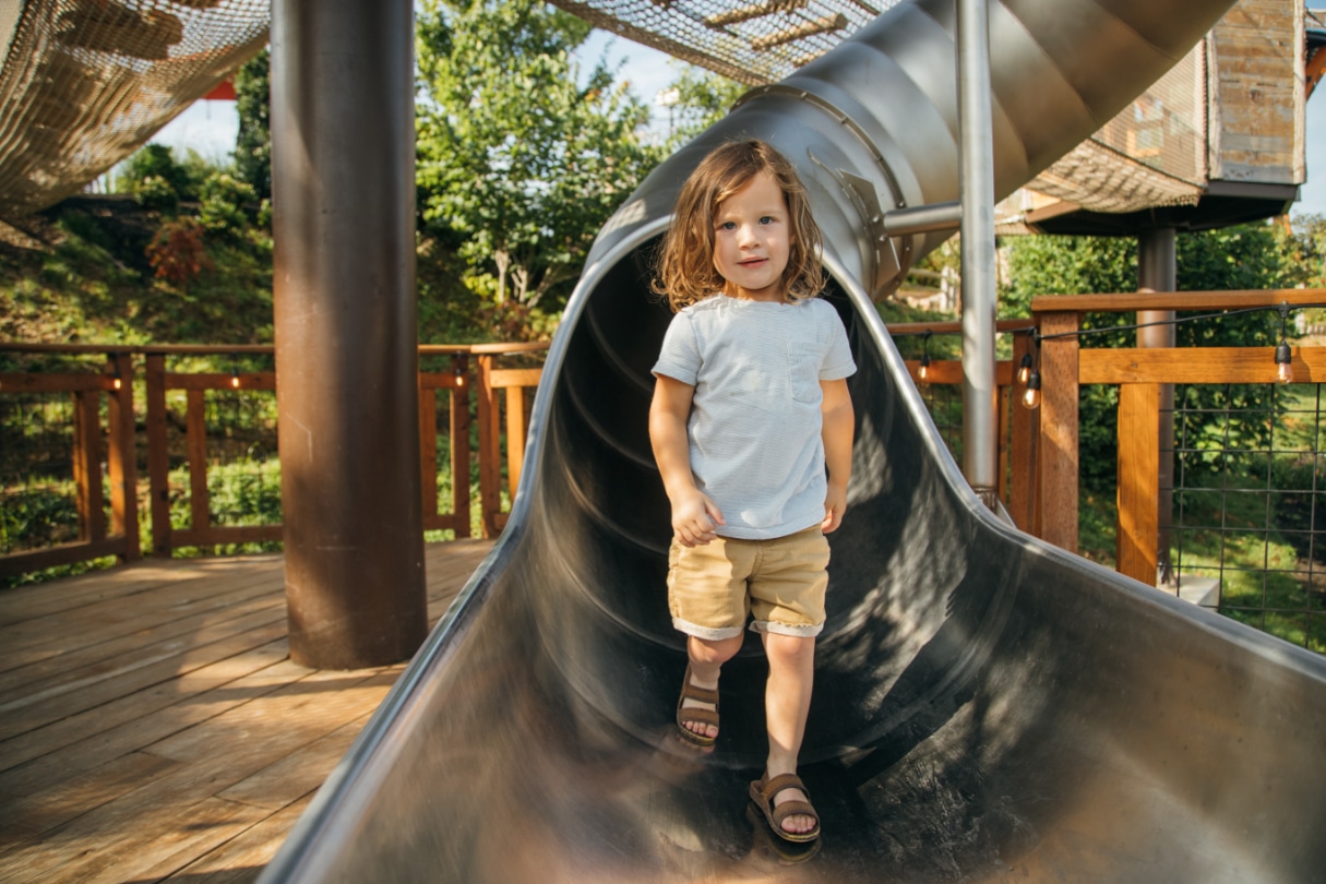 A Child Plays on TreeVenture Challenge at Anakeesta