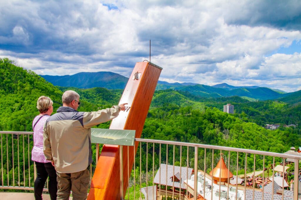 A Couple takes in the Smoky Mountain views on top of AnaVista Tower